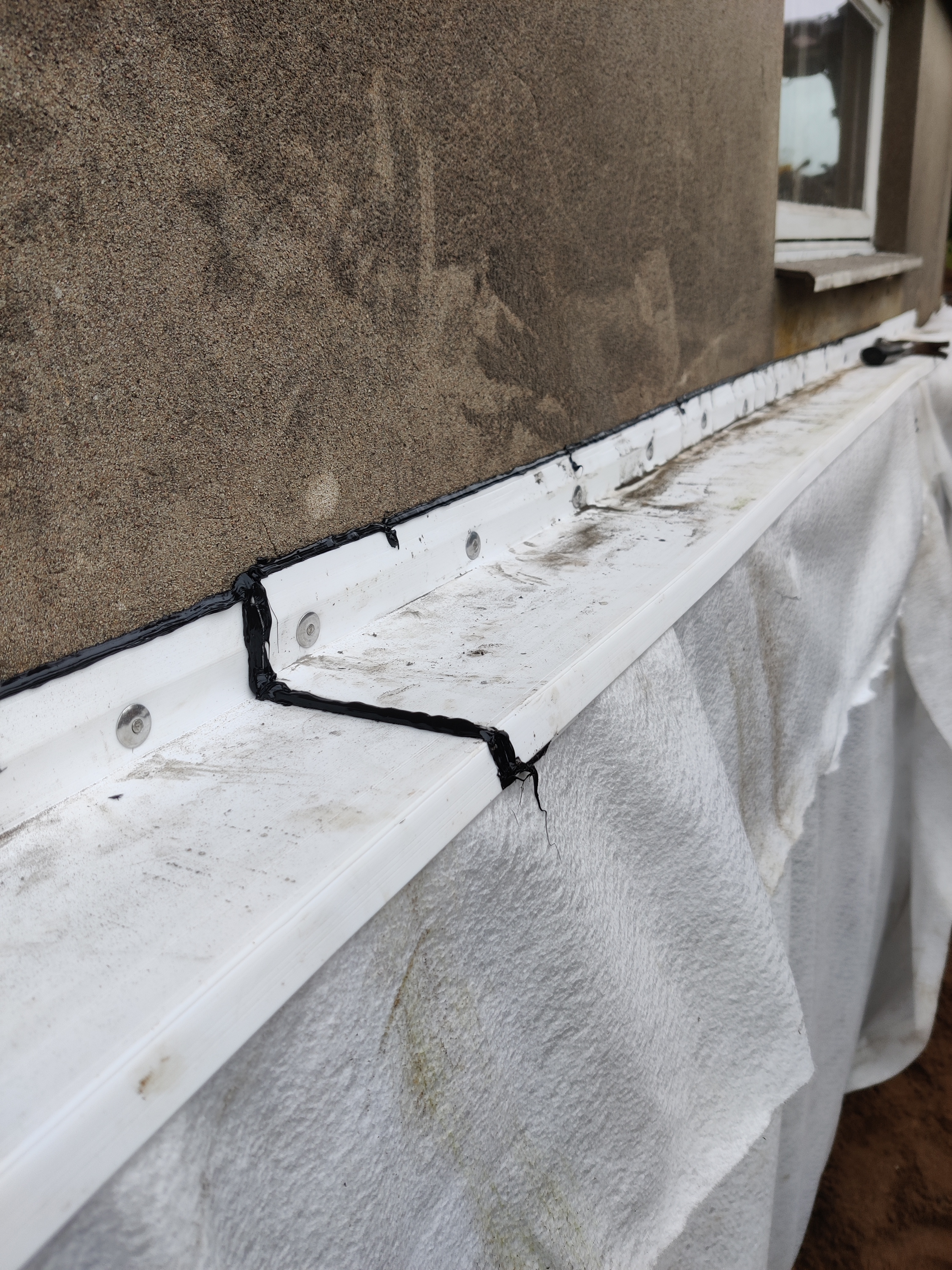 Montage av täcklist Dränering Haverdal